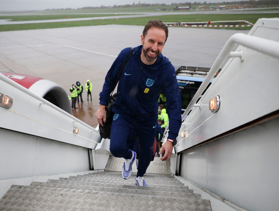 Gareth Southgate was all smiles as he boarded the "Rain Bow" jet