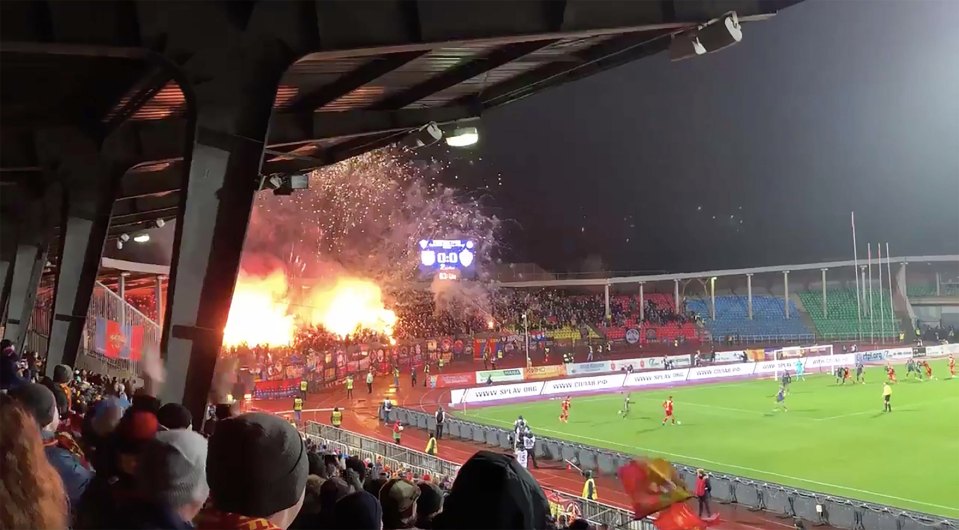 Flare explosions going of during a Russian Premier League game between Arsenal Tula and CSKA