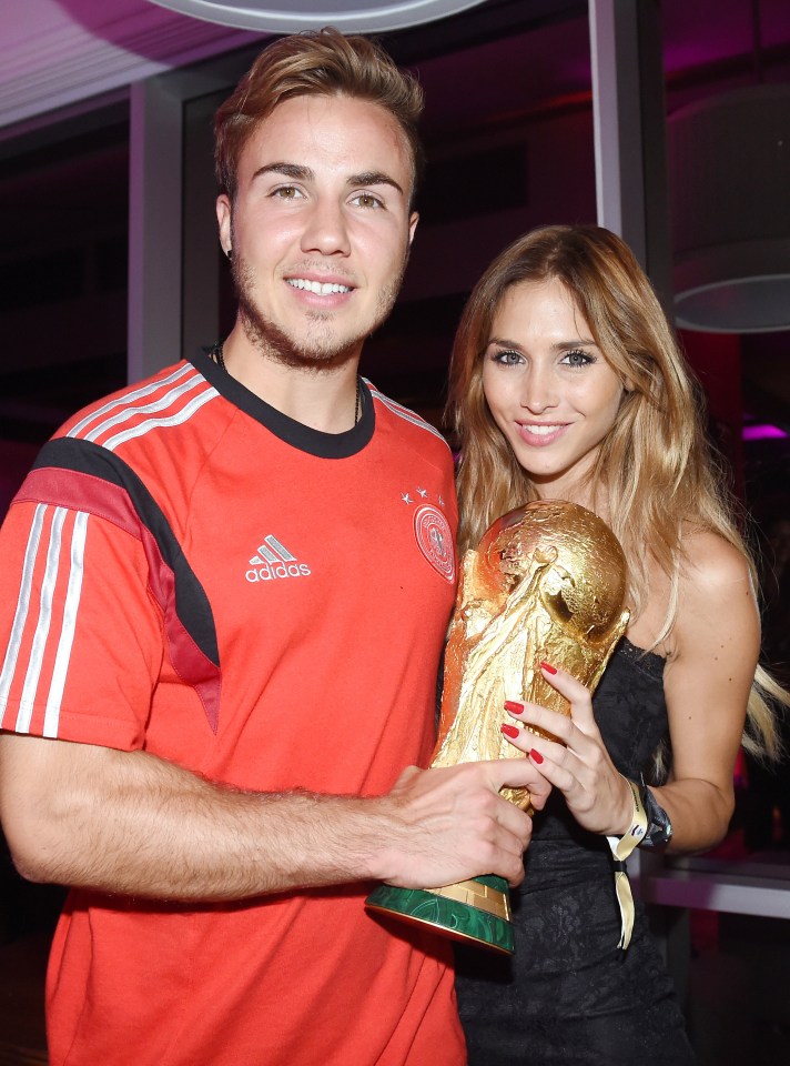 Gotze alongside wife Ann-Kathrin Brömmel