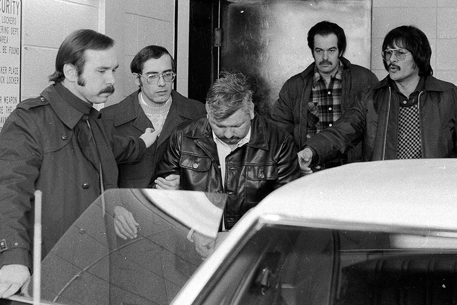 Mr Tovar (far right) was one of the officers who busted Gacy in December 1978