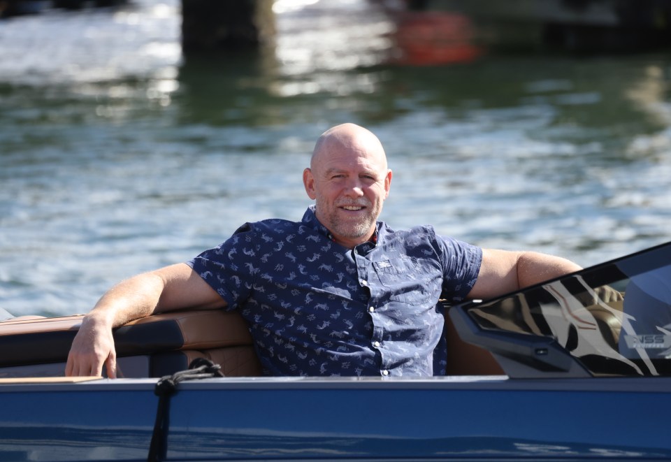 Mike Tindall was soaking up the Aussie son from the back of the boat