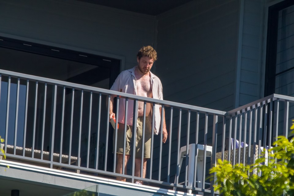 Seann was seen relaxing on a balcony hours before he was preparing to go into camp