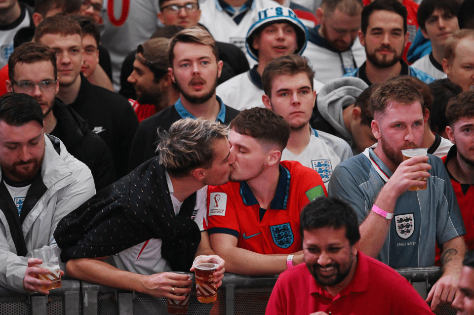 Two fans kiss at Boxpark in Wembley amid fury from the LGBT+ community over Qatar's views