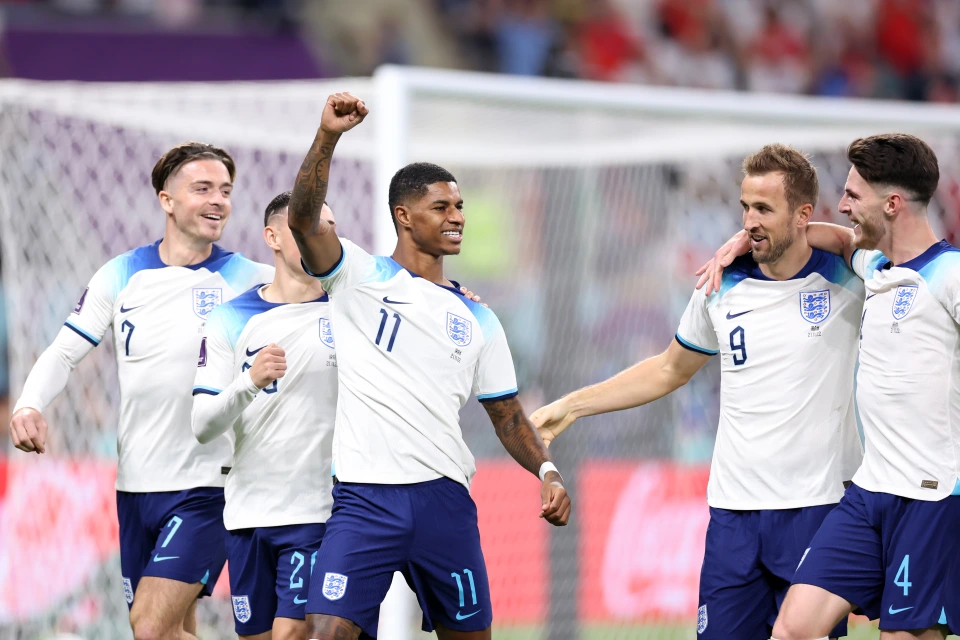 Marcus Rashford celebrates scoring on his first touch of the game