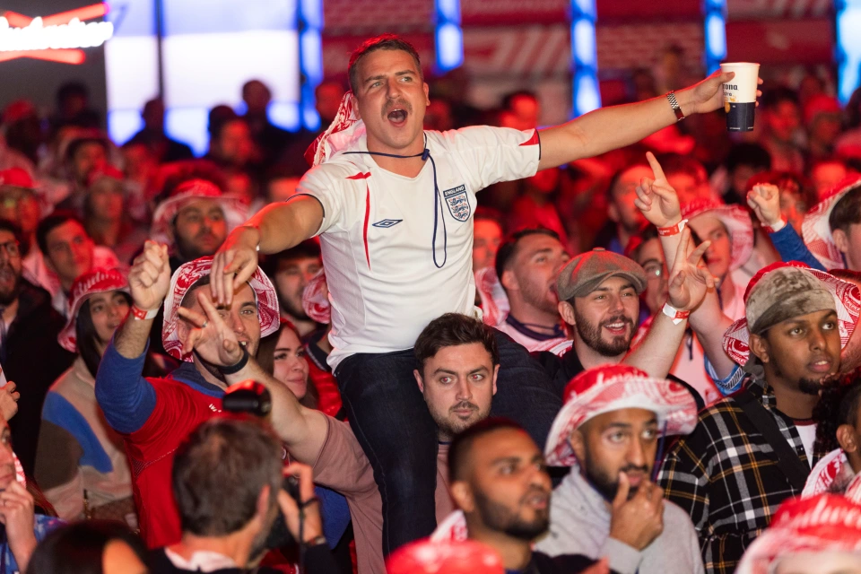 A fan gets a lift as England romp to victory