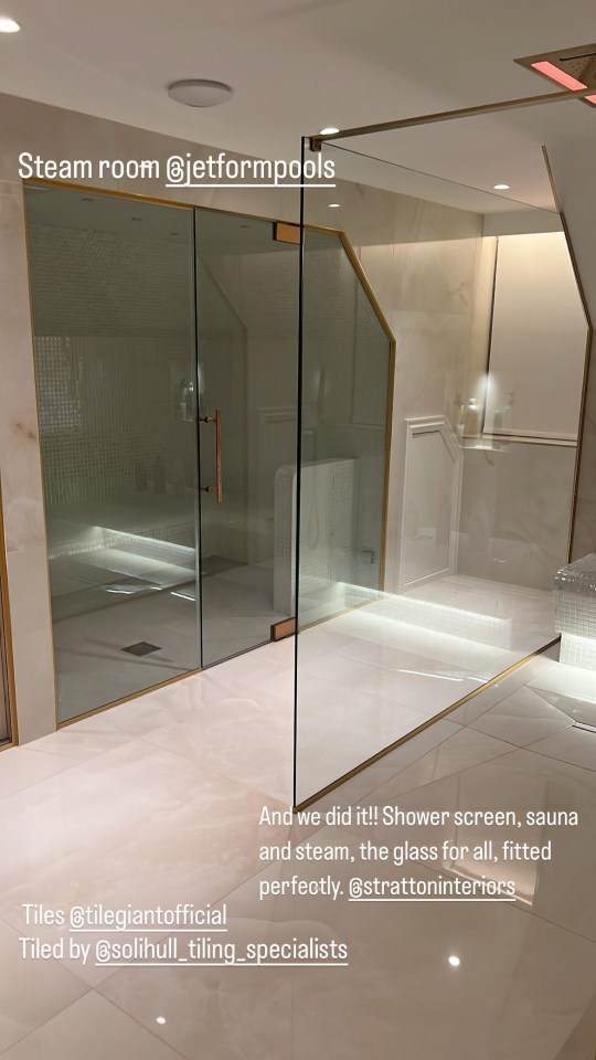 The bathroom was fitted with glass to separate the shower and sauna