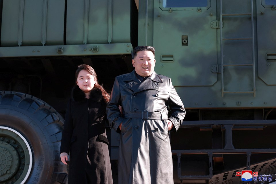 Kim Jong-un poses with his young daughter Ju Ae