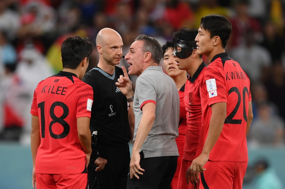 South Korea manager Paulo Bento confronted Anthony Taylor at full-time