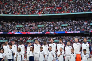  The England squad singing God Save The King before a recent match