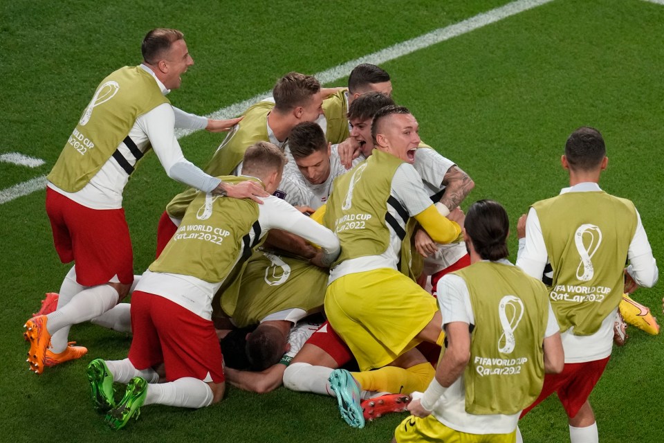 His team-mates mobbed him after he found the net