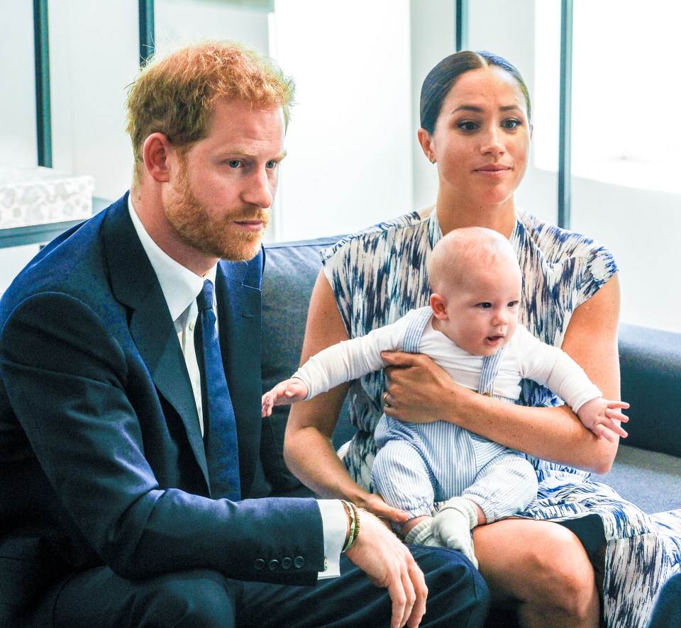 Prince Harry and Meghan are seen with their son Archie