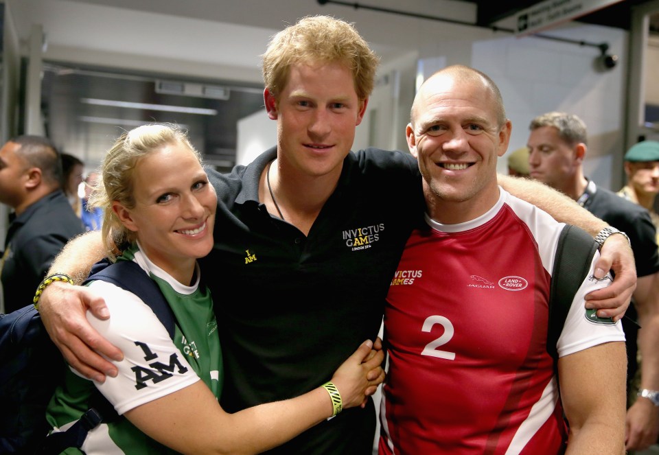 Mike and Zara Tindall either side of Prince Harry after a wheelchair rugby match at the Invictus Games in 2014