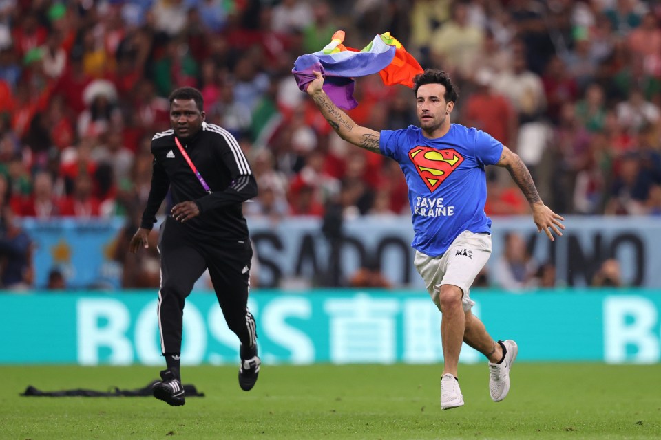 A protestor ran on to the pitch during Portugal’s game with Uruguay this week at the World Cup