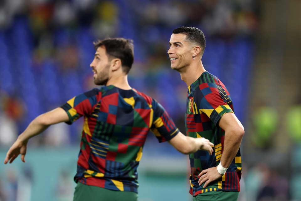 Ronaldo warms up with Bernardo Silva