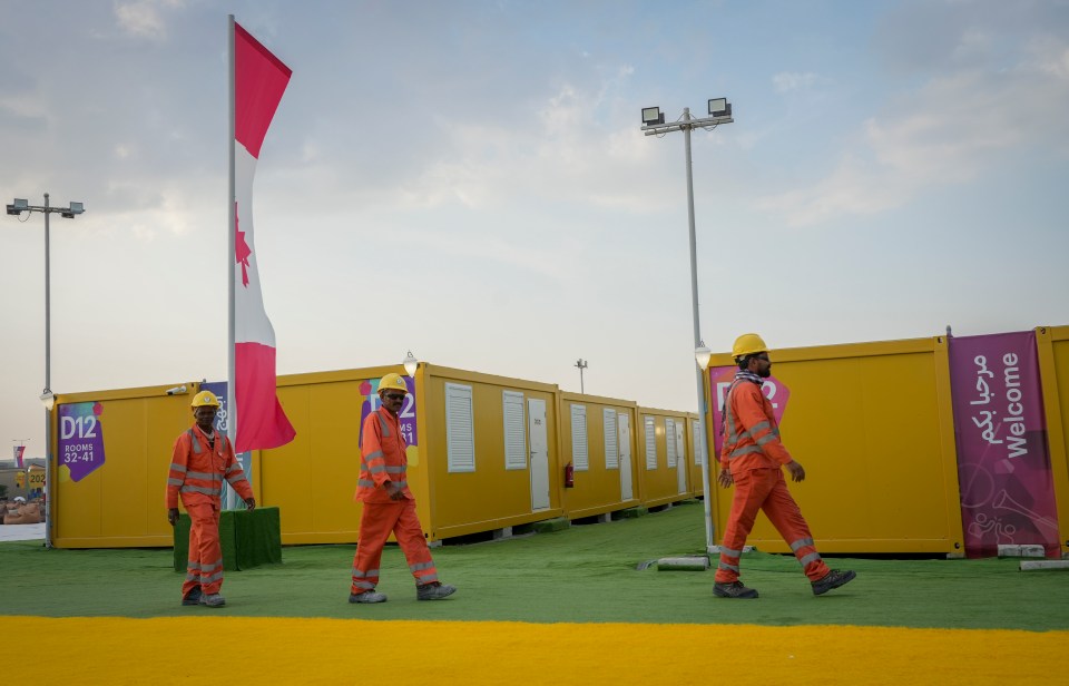 Workmen were still on site even as fans moved in for the World Cup