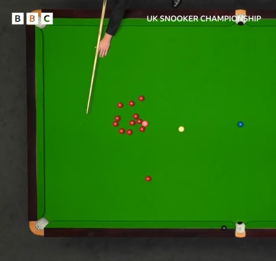 Having aimed for the corner, the black ball flipped up on to the ledge of the table