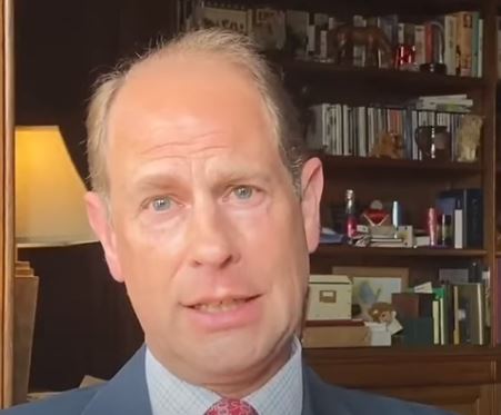 Prince Edward's office has a vast bookcase and wooden features