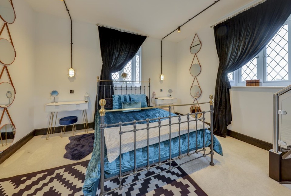 This bedroom continues the house's medieval theme