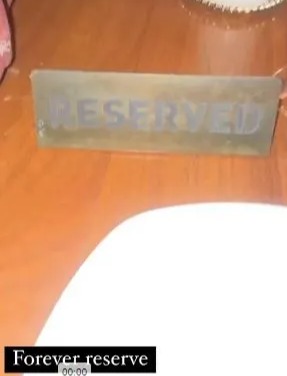 He says the table is permanently reserved