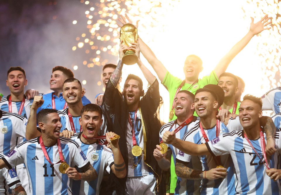 The Argentinian skipper, 35, led his country to victory in an epic match against the reigning champions - pictured lifting the trophy surrounded by team-mates