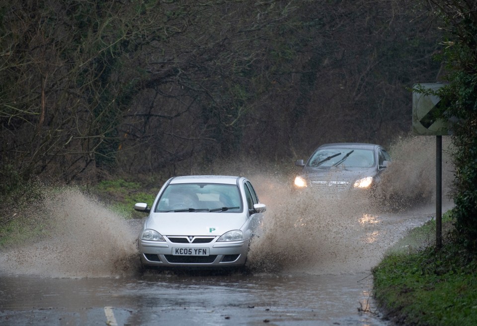 Drivers in Wales and southern England are also battling heavy rain, adding to travel times