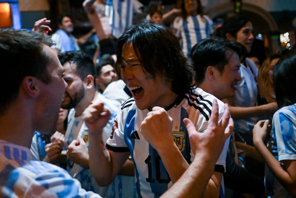 Argentina supporters celebrate at the Joyce Public House bar in New York City