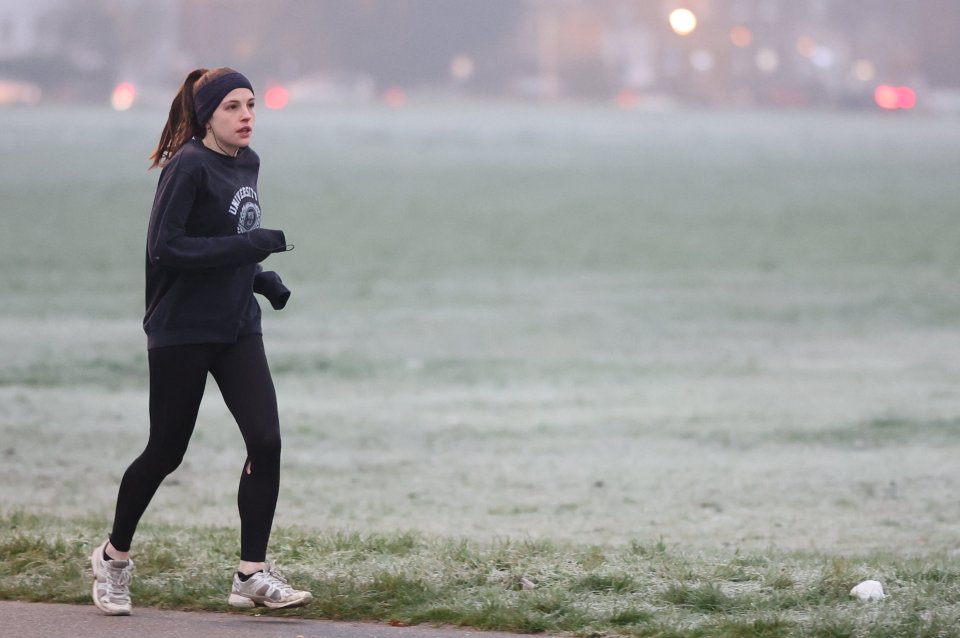 A jogger braved the frosty London morning today