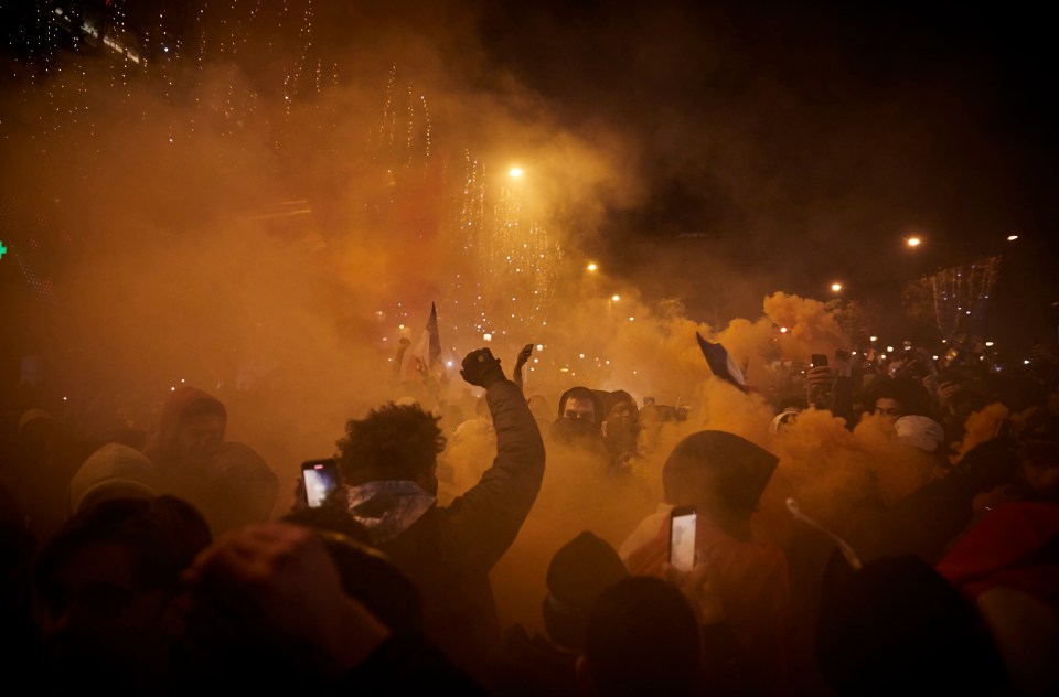 French football fans celebrate in Paris