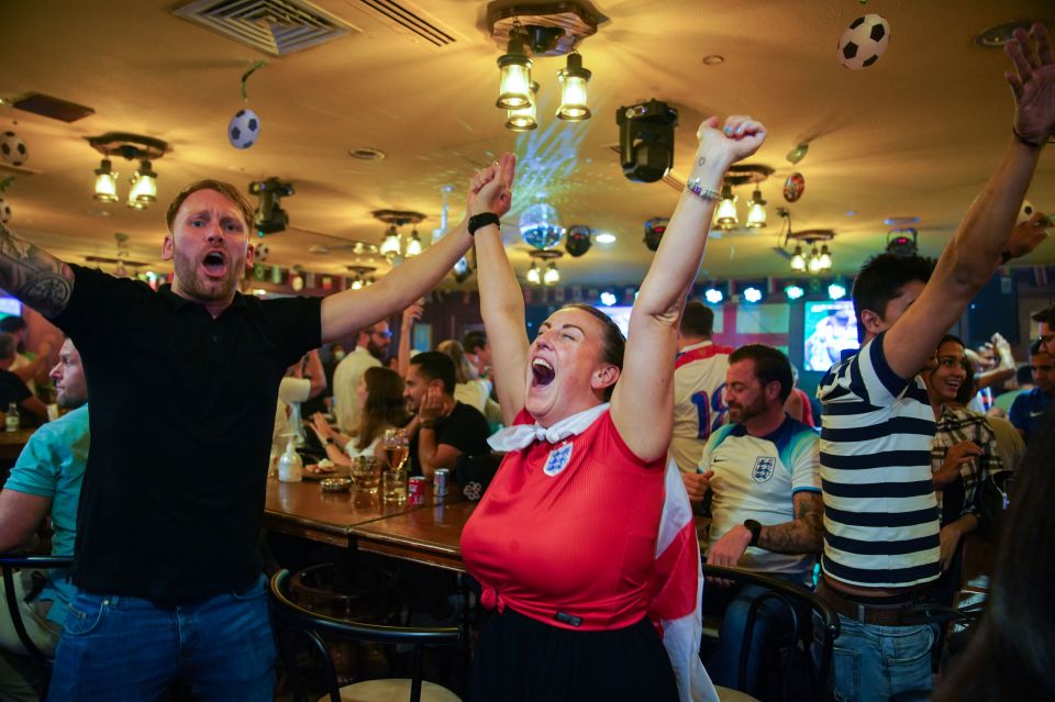 Jubilant cheers at the Red Lion in the Al Mansour Suites Hotel, Doha, Qatar