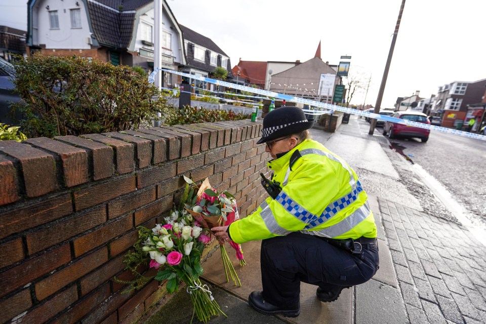 Officers laid tributes left by members of the public