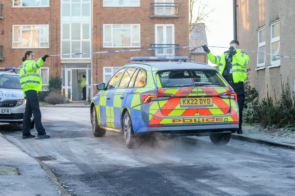 A police cordon remains at the flats today