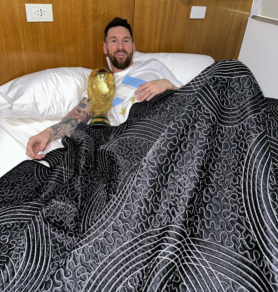 Messi cracked a smile as he cradled the trophy