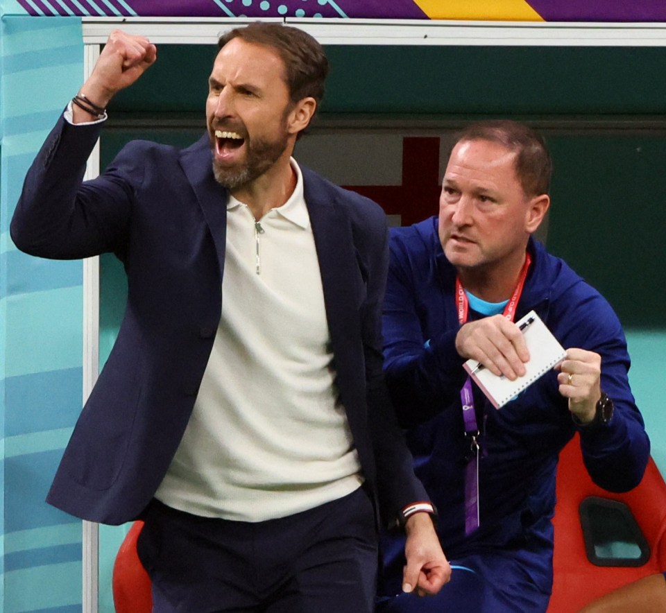 England manager Gareth Southgate celebrates their first goal with assistant Steve Holland