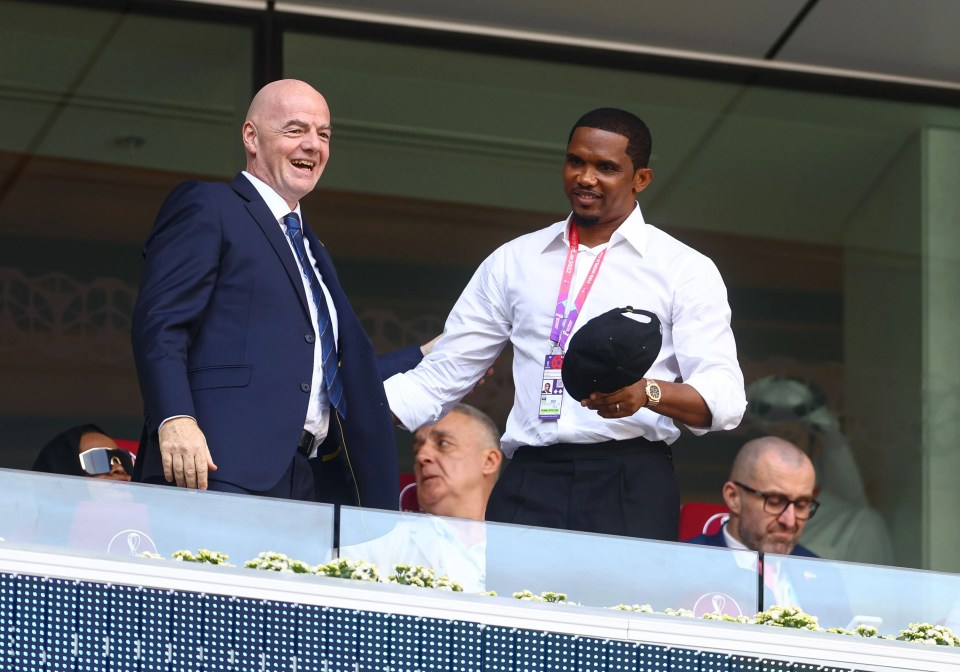 Eto’o greets Gianni Infantino during Cameroon’s clash with Serbia