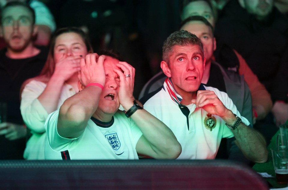 England fans reacted during the game as they watch at Olympia Exhibition Hall in Blackpool