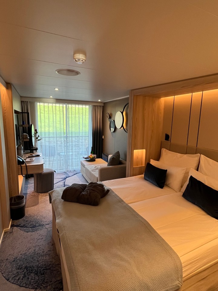 Our balcony cabin on the third deck was ideal — a modern, muted palette with a supremely comfy king-size bed