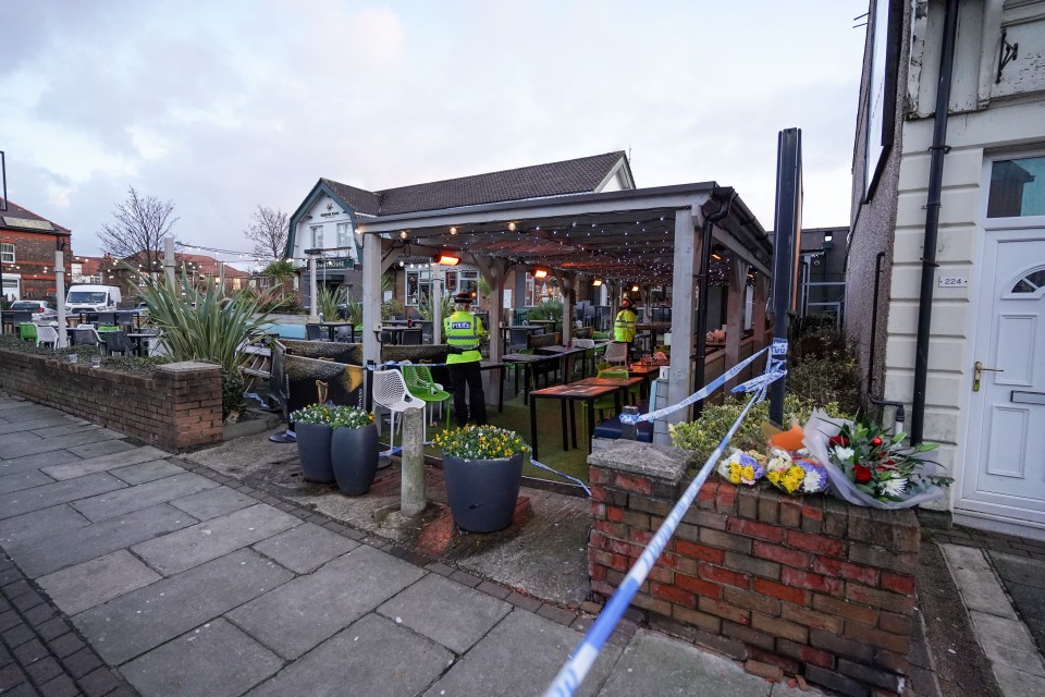 Elle was with Christmas revellers in a pub's heated outdoor area festooned with fairy lights when she was shot