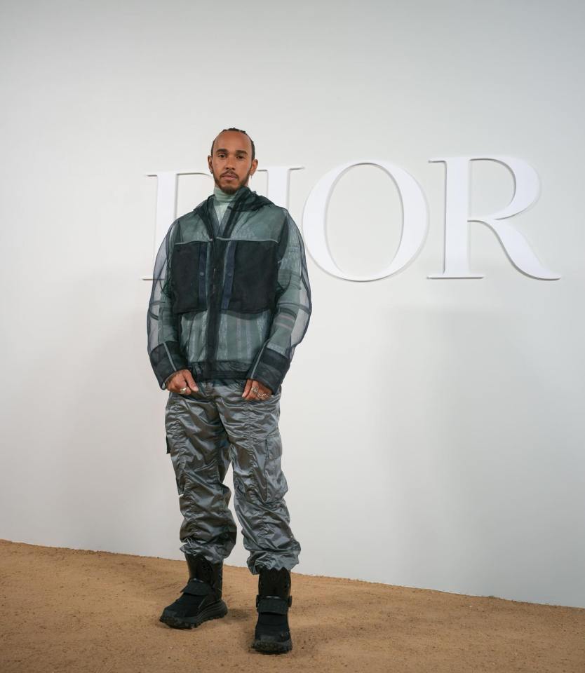 Hamilton also posed in front of a Dior backdrop