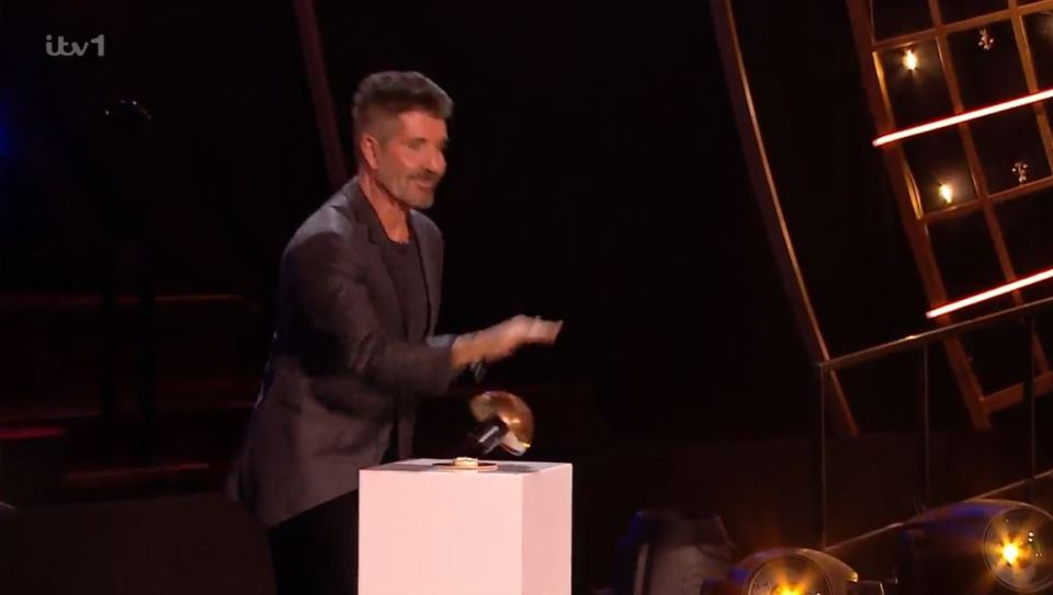 Simon was seen breaking the buzzer on the show