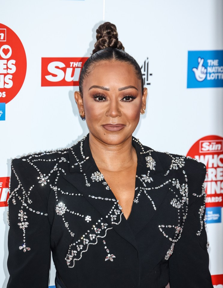 Mel B will walk down the isle in a dress made by former bandmate Posh - unlike Victoria's own daughter-in-law Nicola Peltz