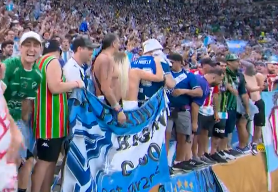 The blonde supporter was celebrating Argentina's win over France