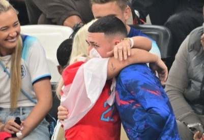 Phil Foden received a warm hug from his girlfriend Rebecca Cooke