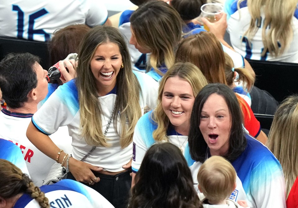 Luke Shaw’s partner Anouska Santos and Katie Goodland, wife of Harry Kane, were in high spirits in the stands before England’s clash with France