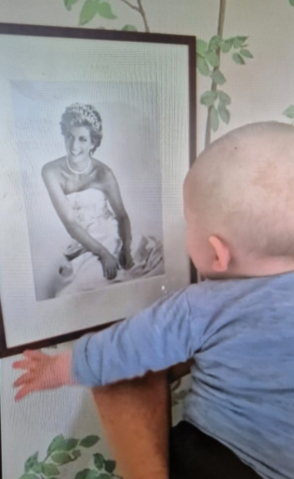 Archie is seen babbling at a picture of Princess Diana as Meghan holds him up to his grandma