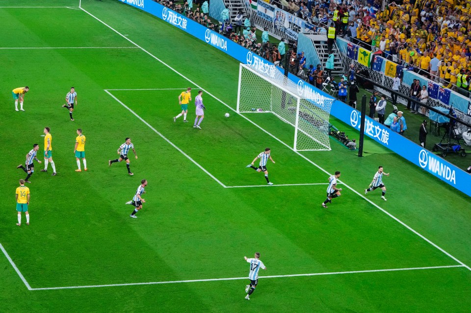 The Argentina players immediately sprinted over to mob Messi