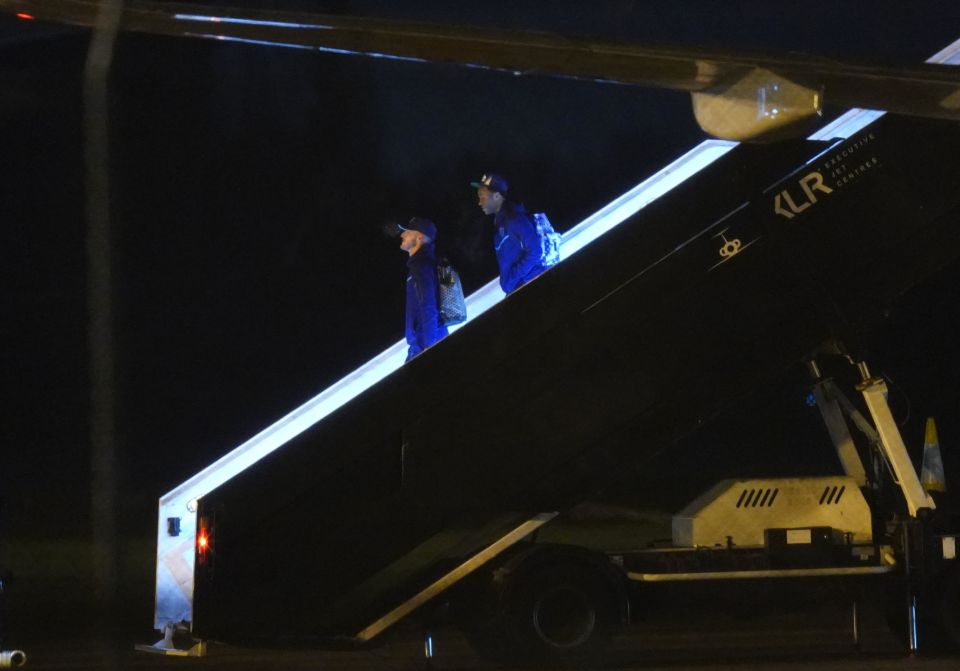 England's squad have landed back on home soil after their World Cup exit