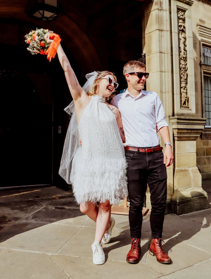 Cloë wore a short white feathered frock from ASOS,  £110  with Nike Airforce trainers she already owned and a pair of £3 heart sunglasses from eBay.