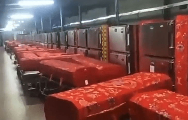 A long line of coffins waiting at a crematorium in Tianjin