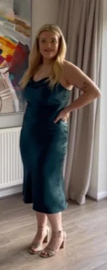 Her followers loved this green satin midi dress