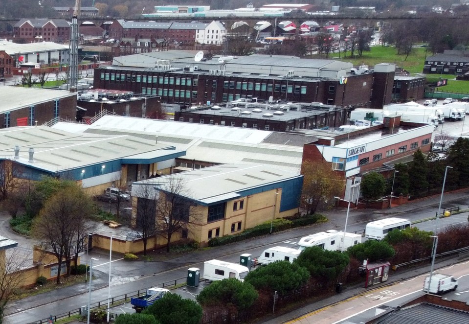 Aerial photos show the caravans lined up with the studios (the dark brown building) in the background